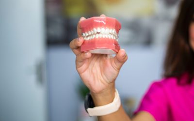 Should I Get Dentures or Dental Implants?